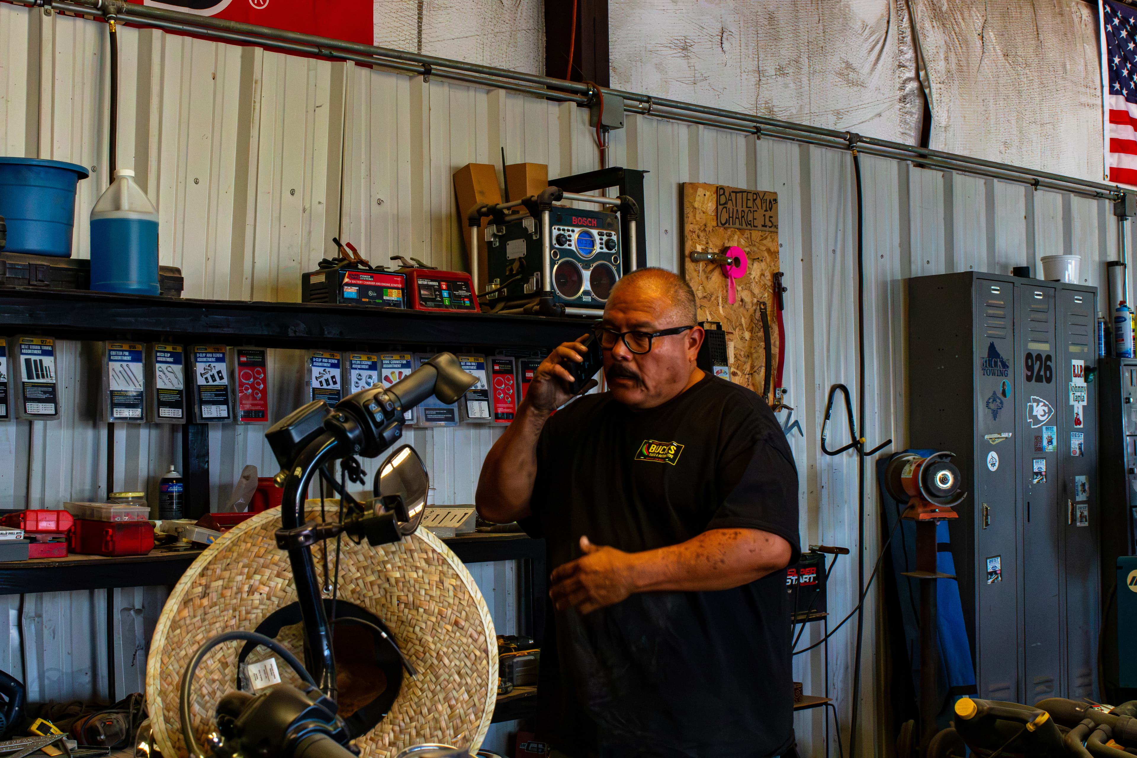 Buck's Towing team member assisting a customer by phone