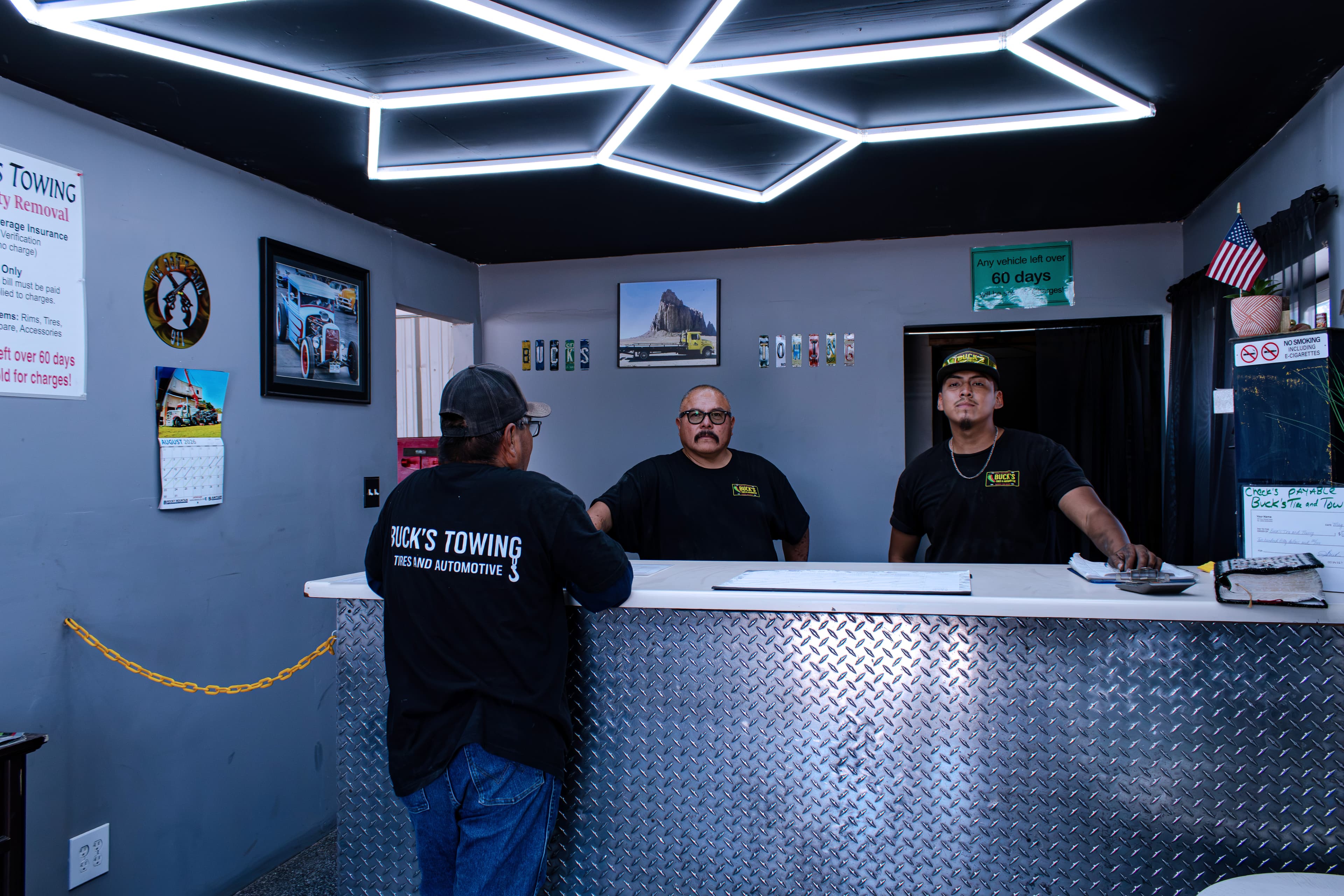 Buck's Towing helping a customer at the front counter
